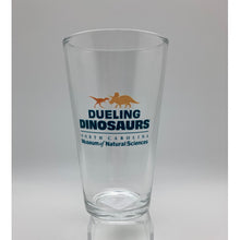 Load image into Gallery viewer, Dueling Dinosaurs Pint Glass
