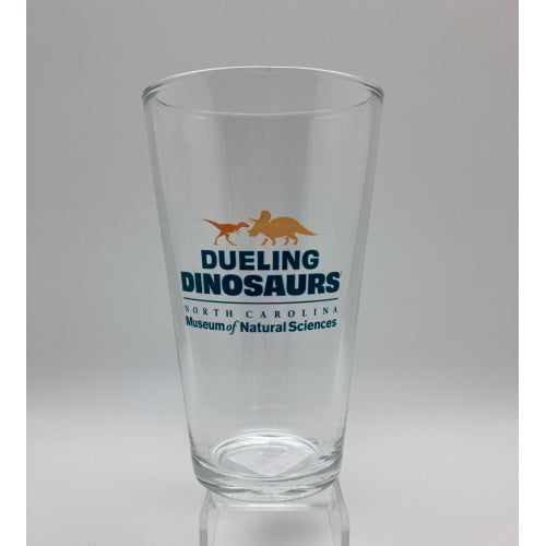 Dueling Dinosaurs Pint Glass